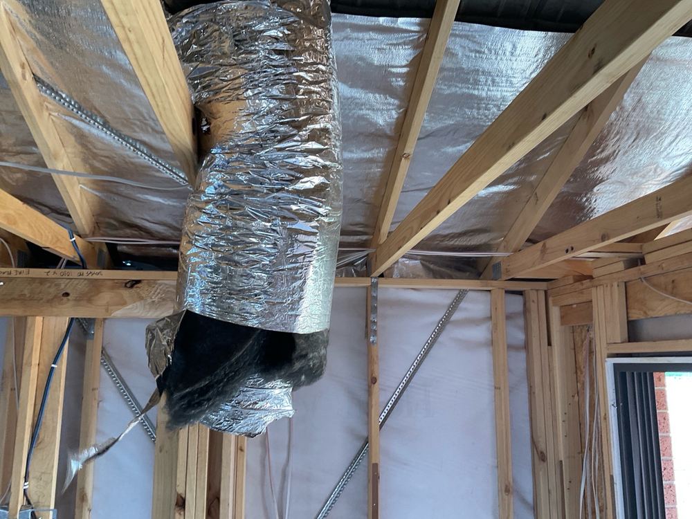 Anti-ponding board missing at the eaves under a sarked tile roof, found during a lock-up inspection in Strathtulloh
