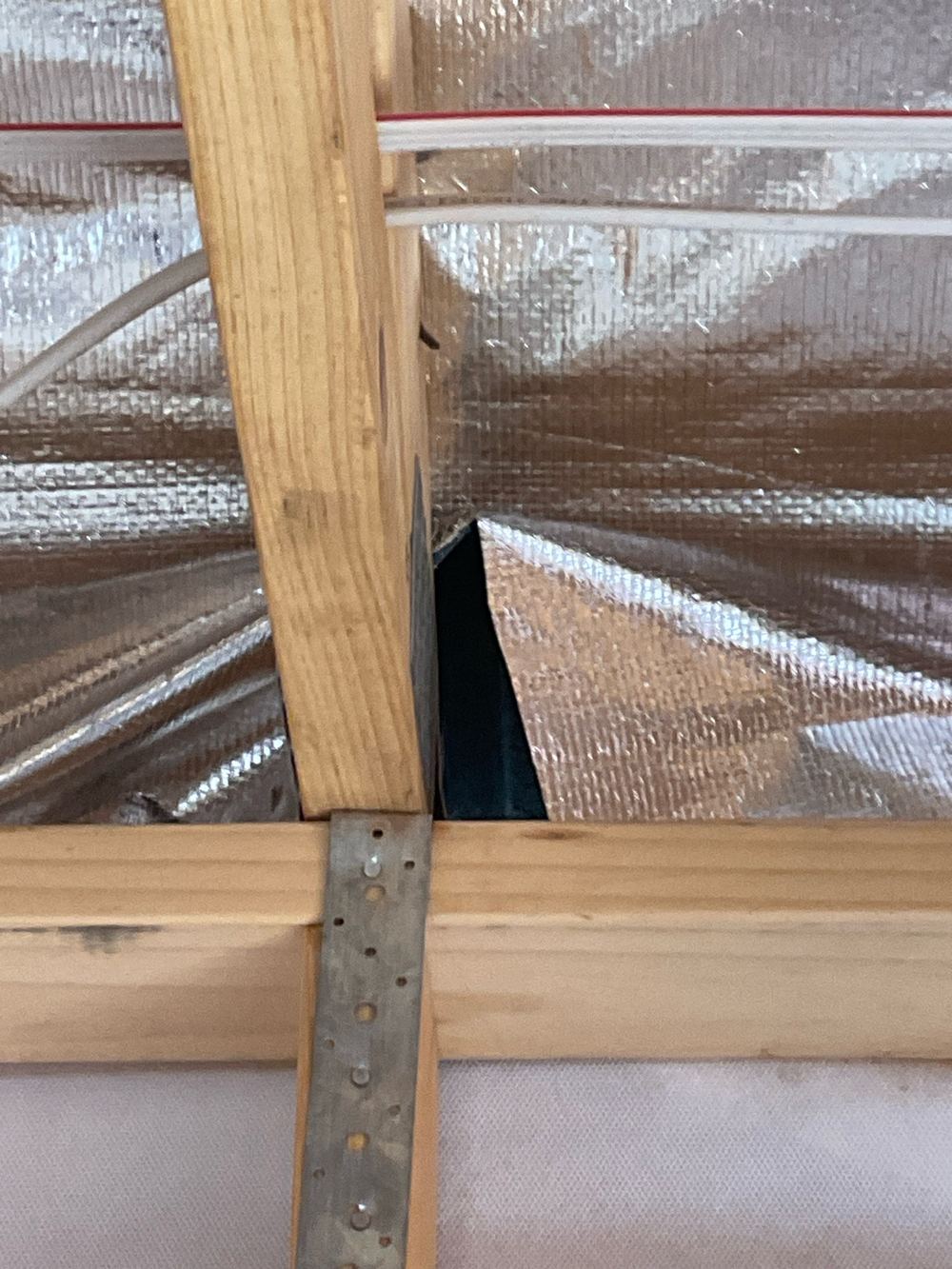 Torn sarking in several places that needs taping before linings go up, Strathtulloh