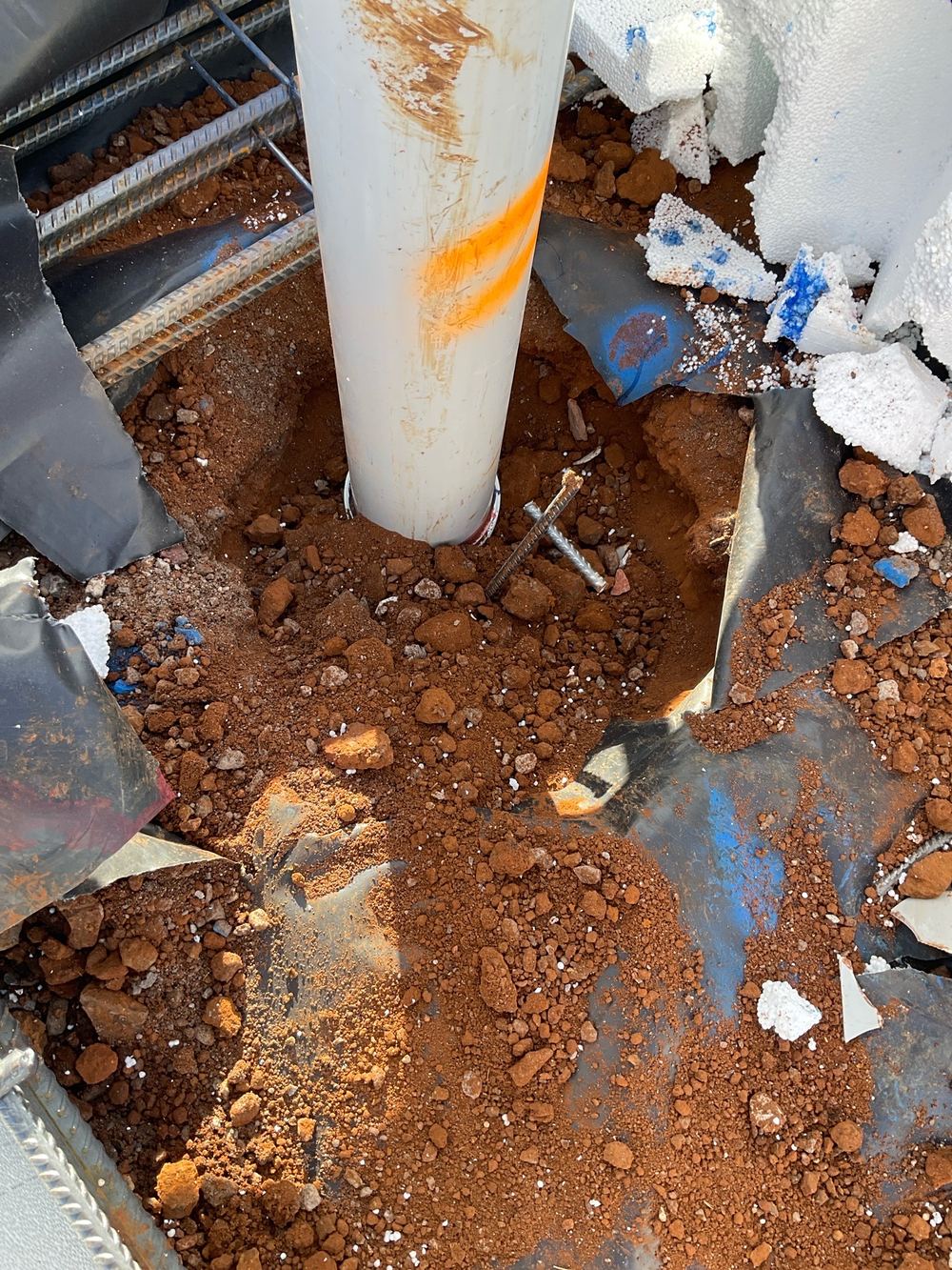 Holes in the vapour barrier left without a polyethylene patch and tape, found during a slab pre-pour inspection in Strathtulloh